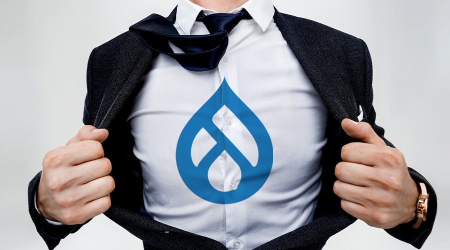 Man wearing a suit, repping Drupal